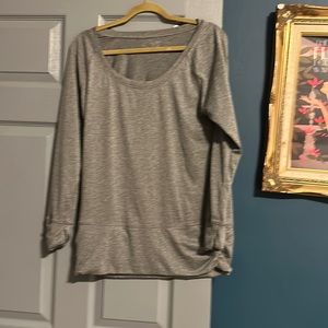 Long sleeved gray workout shirt. Champion. Medium.